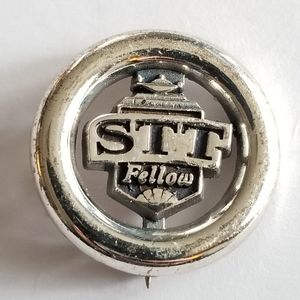 STT Fellow silver tone lapel pin genie oil lamp